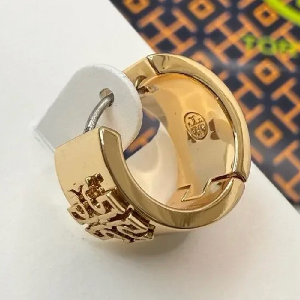 Authentic Tory Burch Britten
Huggie Earring , In Tory Gold. NWT.